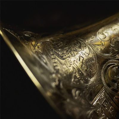 Closeup of 1886 Conn Cornet Bell Engraving