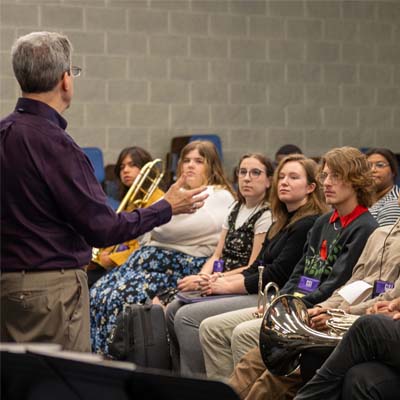 Clinician giving a presentation