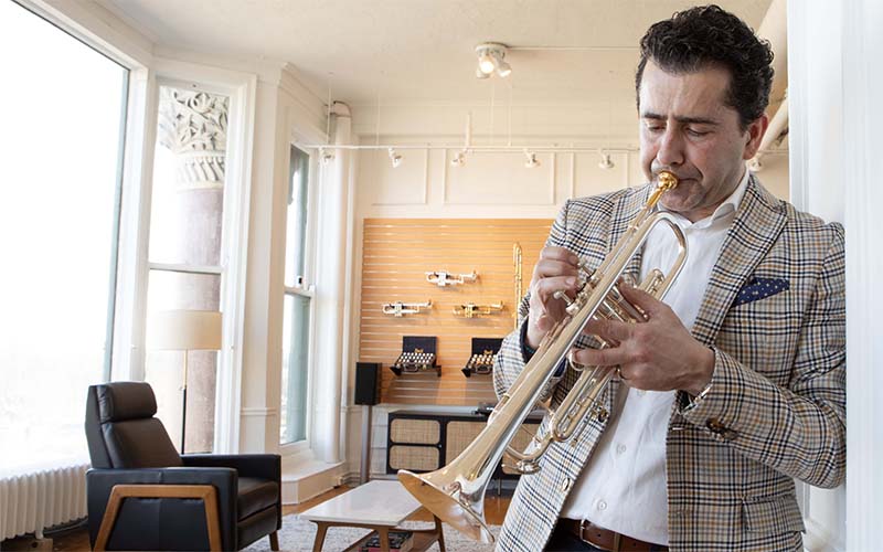 Artist playing a trumpet