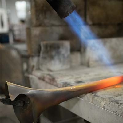 Trumpet bell in the torch