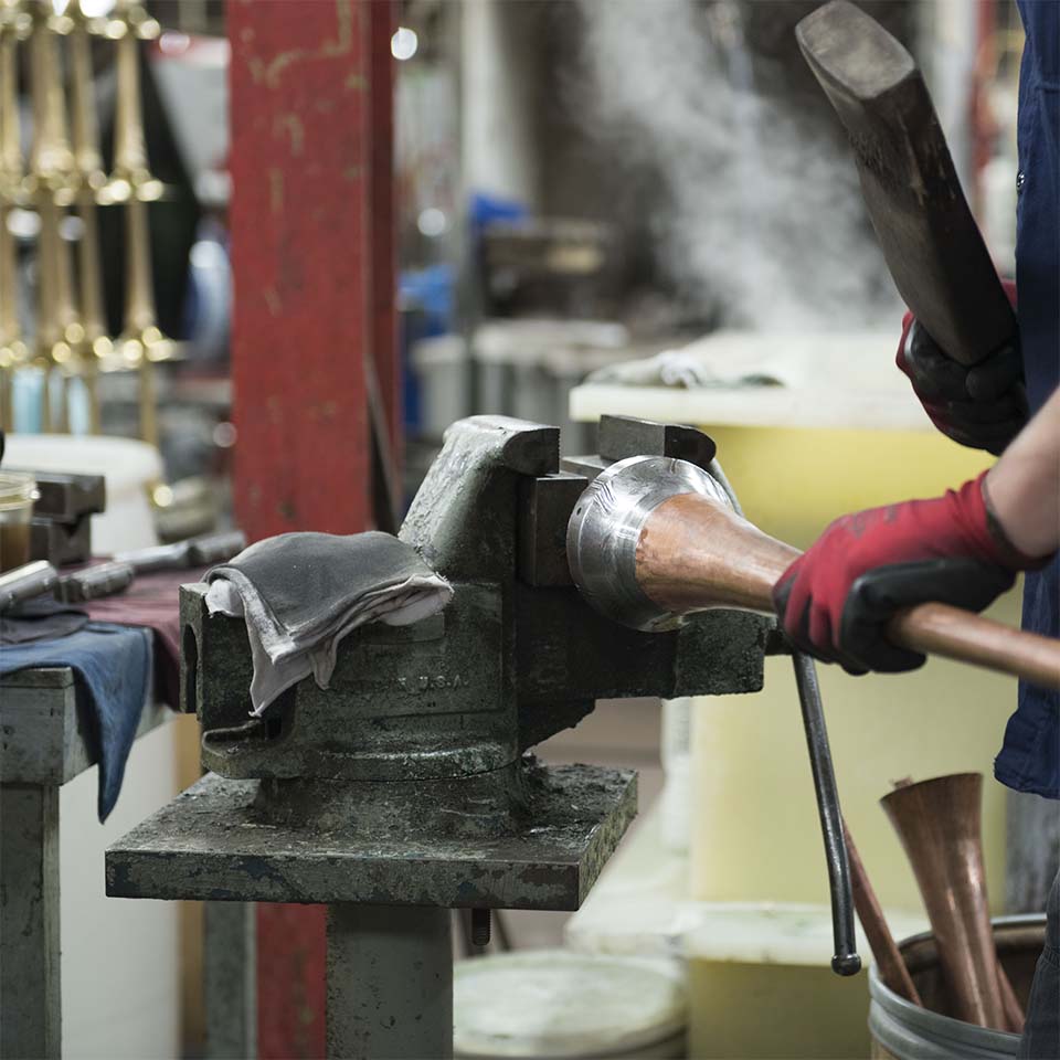 Employee working an instrument bell