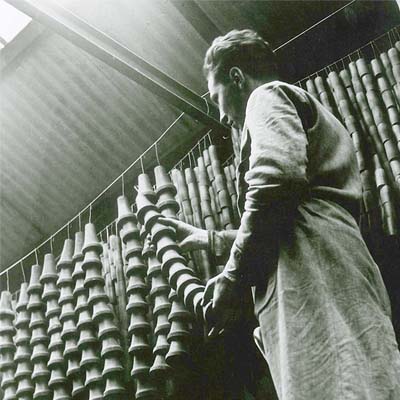 Employee working on clarinets