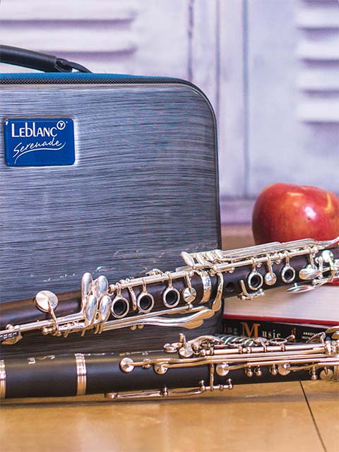 Instruments and an apple in front of lockers