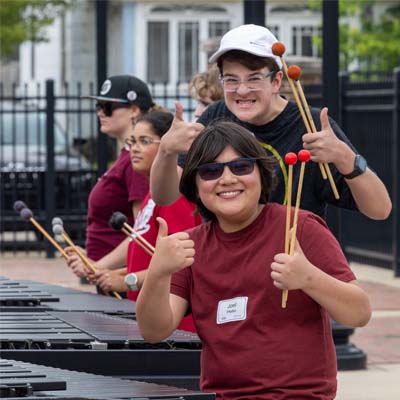 Students Giving Thumbs Up