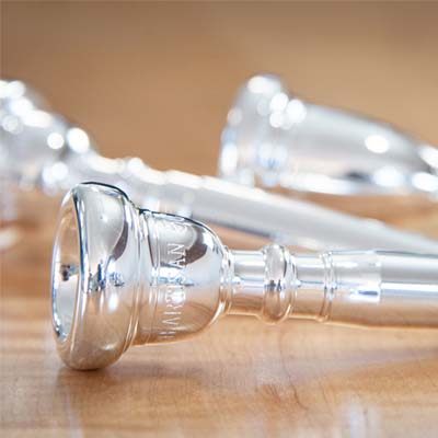 Bach mouthpieces in a holding rack