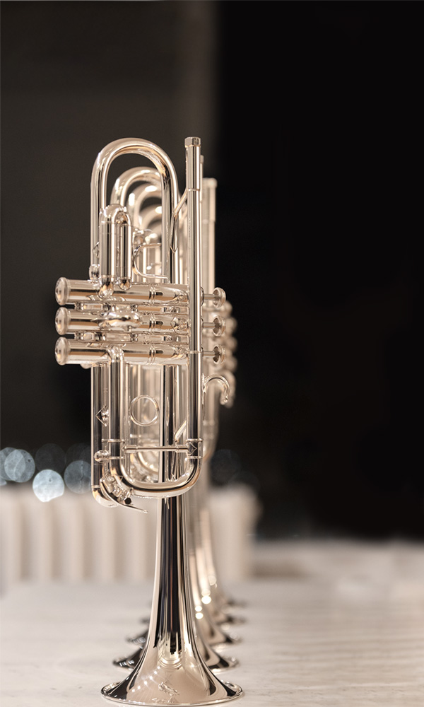 Bach C-Trumpets standing in a row