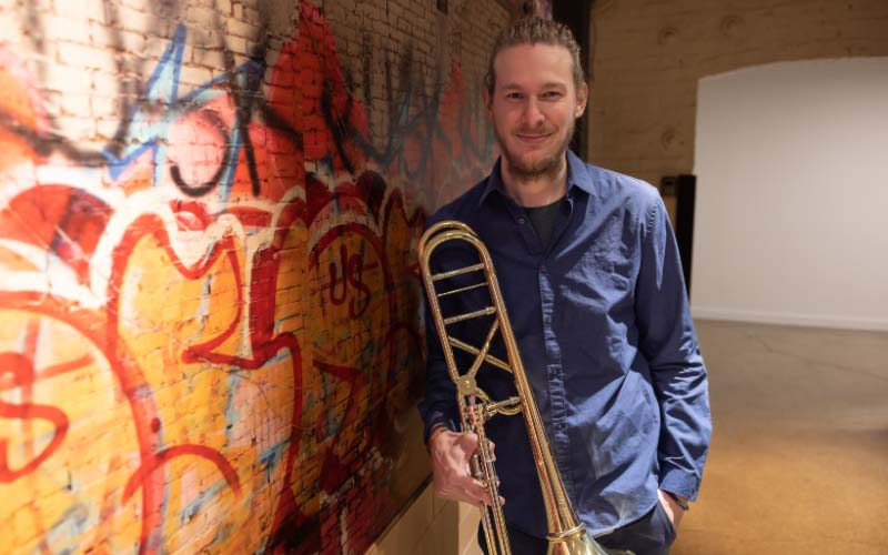 Peter Steiner holding a trombone