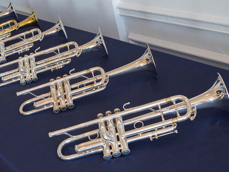 Row of Trumpets on a table