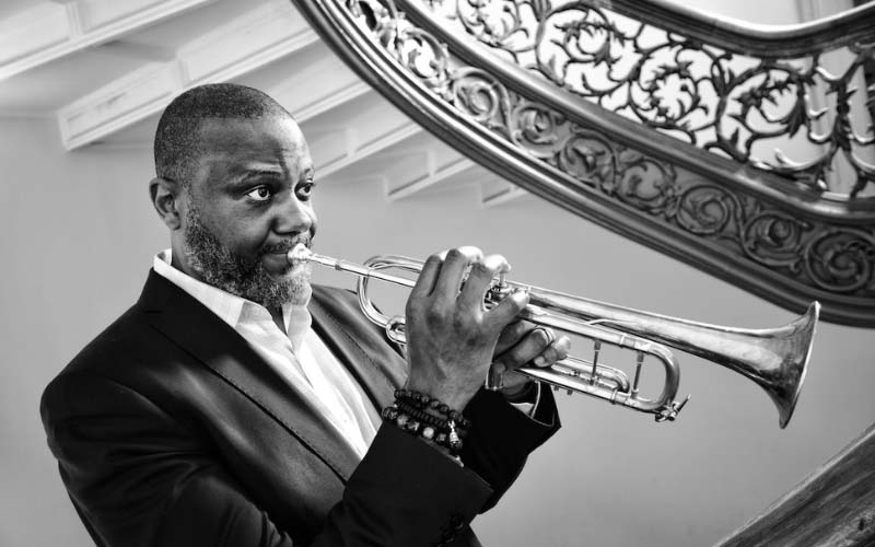 Sean Jones playing a trumpet