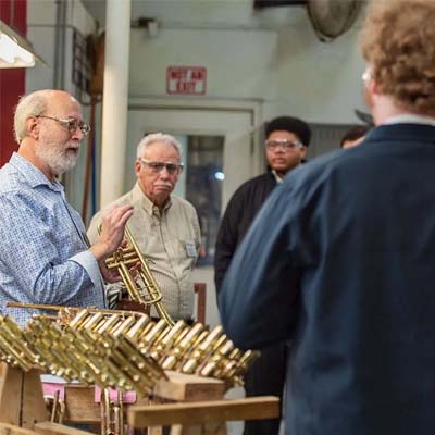 Employee working with mouthpieces