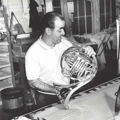 Employee Testing a Horn