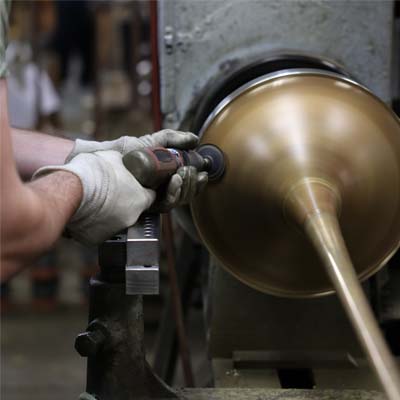 Employee working a spinning bell